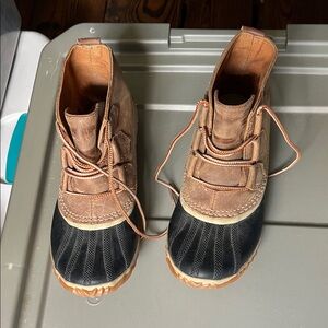 Sorel Tan and Black Winter Boots